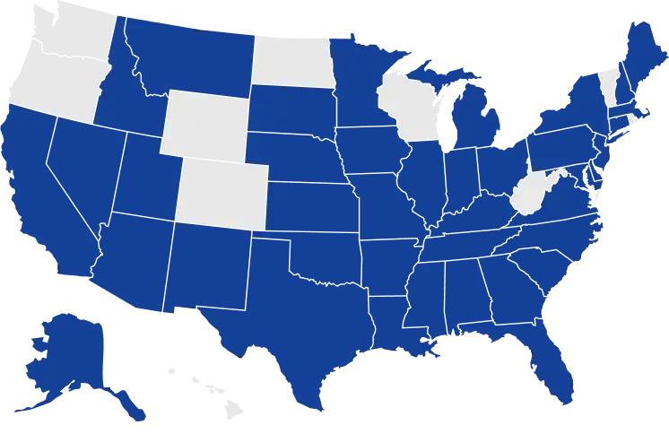 Map of the USA highlighting states where Freedom Debt Relief services are available, shown in blue